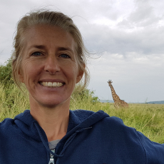 Monica L. Bond with giraffes